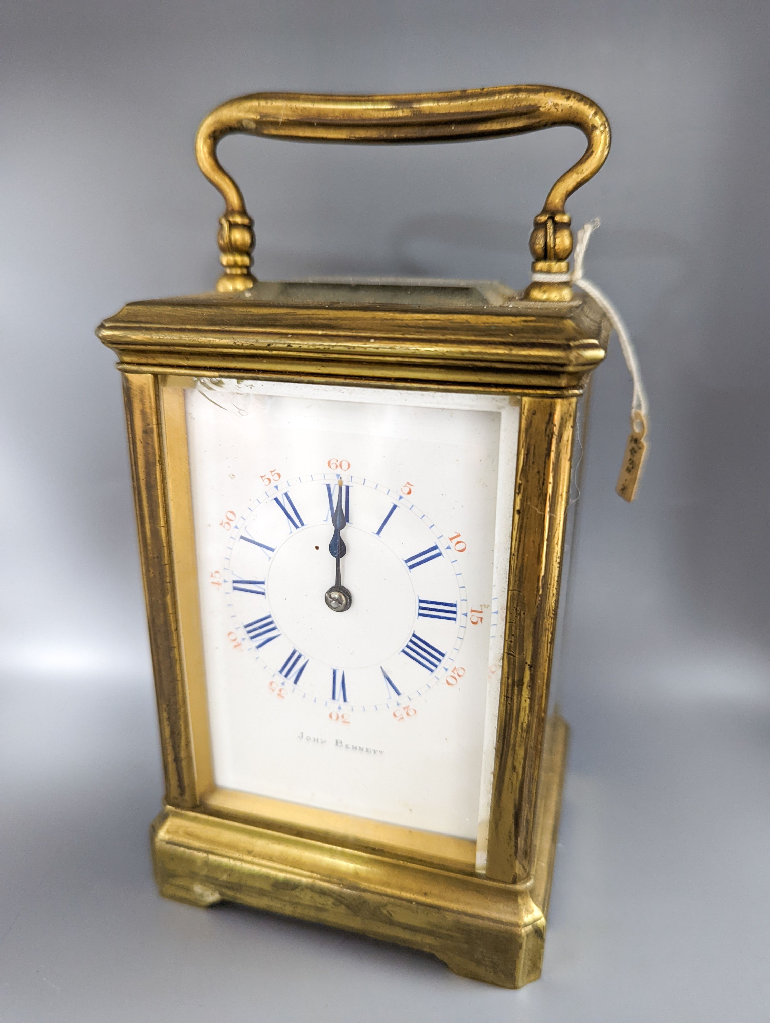 A French brass carriage clock, retailed by John Bennett, height 12cm
